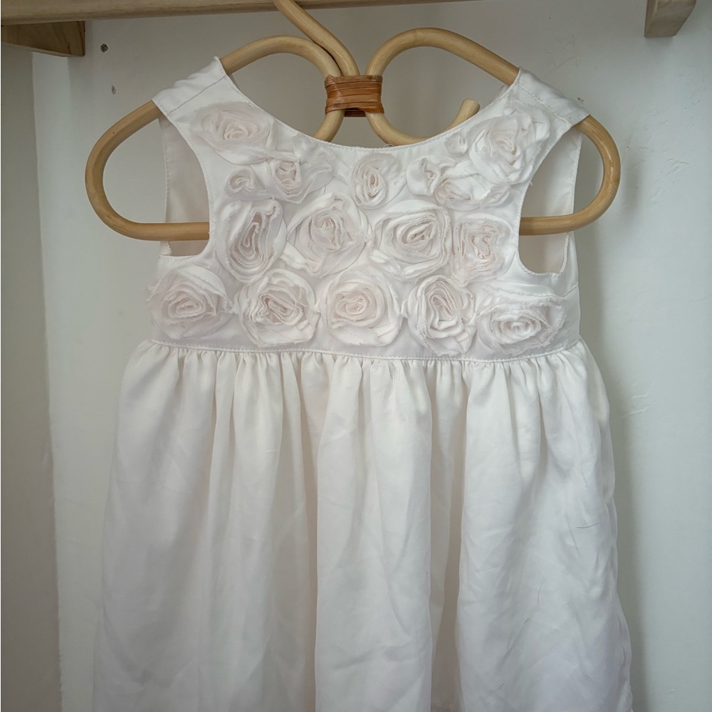 Elegant White Dress with Floral Accents